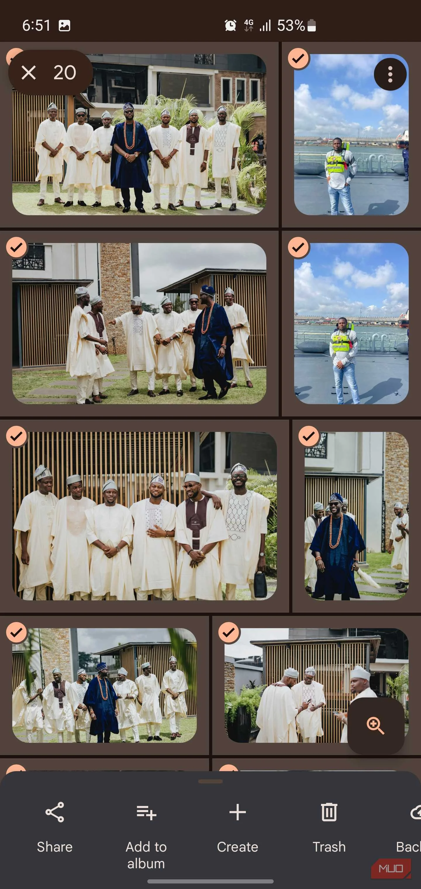 Photos app displaying a grid of pictures with several selected, showing the share button.