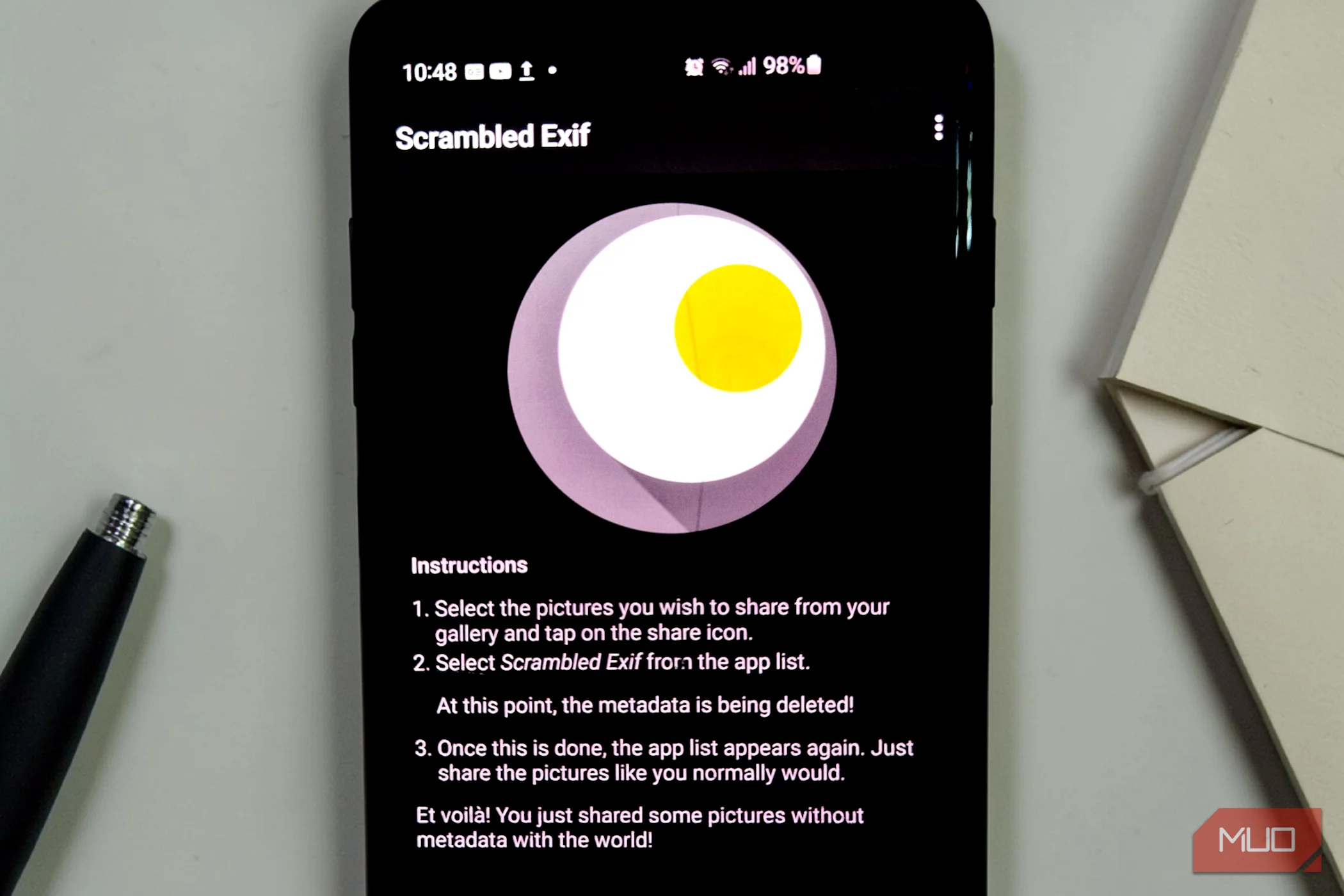 Smartphone displaying the Scrambled Exif app's home screen.